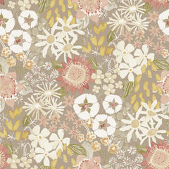 Karina Wildflower Garden Wallpaper by York Wallcoverings features a vintage botanical design with a seamless pattern of hand-drawn flowers and leaves in muted pink, cream, yellow, and green tones on a taupe background.
