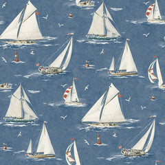 The Chesapeake Leeward Sailboat Wallpaper by York Wallcoverings features a repeating pattern of sailboats with white sails and red flags drifting on blue water, accompanied by seagulls and small lighthouses.