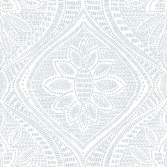 The Scout Floral Ogee Wallpaper by York Wallcoverings features a light gray and white floral geometric pattern, highlighted by a central flower motif framed with dotted and curved lines for a textured, symmetrical design.