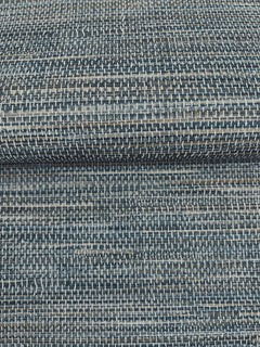 A close-up of dark blue and grey Winn Faux Grasscloth Wallpaper by York Wallcoverings, featuring a woven, horizontal texture.