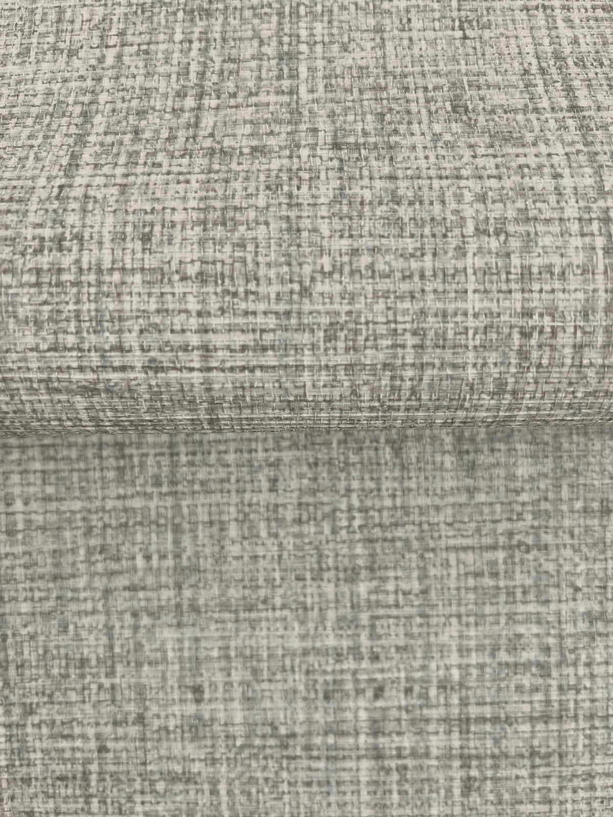 Clarkson Woven Wallpaper in gray with a textured, woven fabric appearance.