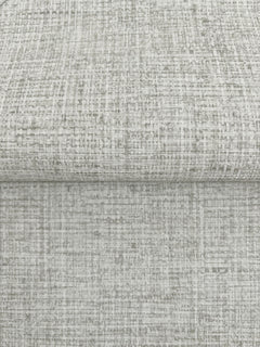 A folded piece of Clarkson Woven Wallpaper featuring a light gray, textured, cross-hatched pattern.