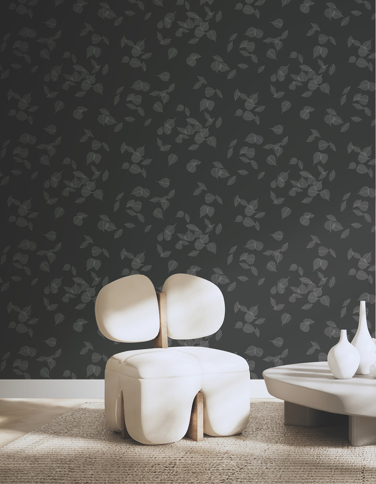 Myles Leaves Wallpaper featuring a pattern of delicate, light-colored leaf outlines against a dark gray background.