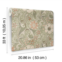 The Chesapeake Liora Floral Trail Wallpaper by York Wallcoverings features a green, orange, and beige floral pattern and comes in rolls measuring 33 ft (10.05 m) long and 20.86 in (53 cm) wide.