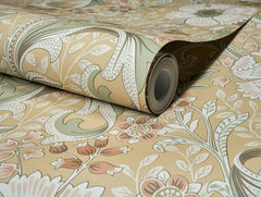 A close-up of the Chesapeake Liora Floral Trail Wallpaper by York Wallcoverings shows an unfolded section with a detailed floral pattern in beige, green, and muted red tones, featuring intricately designed leaves and flowers.