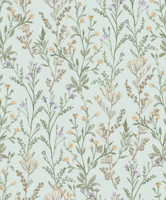 The Chesapeake Laverne Wildflowers Wallpaper by York Wallcoverings features a seamless pattern of delicate wildflowers and leafy stems in muted green, yellow, and lavender tones on a light blue background, creating a soft, vintage, and natural ambiance.