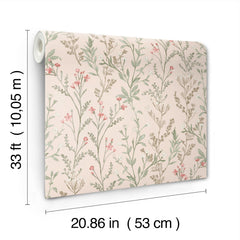 The Chesapeake Laverne Wildflowers Wallpaper by York Wallcoverings features a pink background adorned with green leaves and small pink flowers. Each roll measures 33 ft (10.05 m) long and 20.86 in (53 cm) wide.