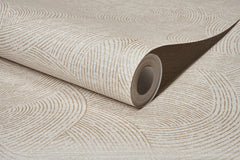 A partially unrolled roll of Chesapeake Harrison Swirling Geometric Wallpaper by York Wallcoverings showcases a beige and cream pattern with curved, textured lines forming abstract geometric shapes.