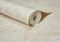 A close-up of the Chesapeake Sonny Fronds Wallpaper by York Wallcoverings, featuring a subtle leaf pattern in beige, partially unrolled on a matching background.