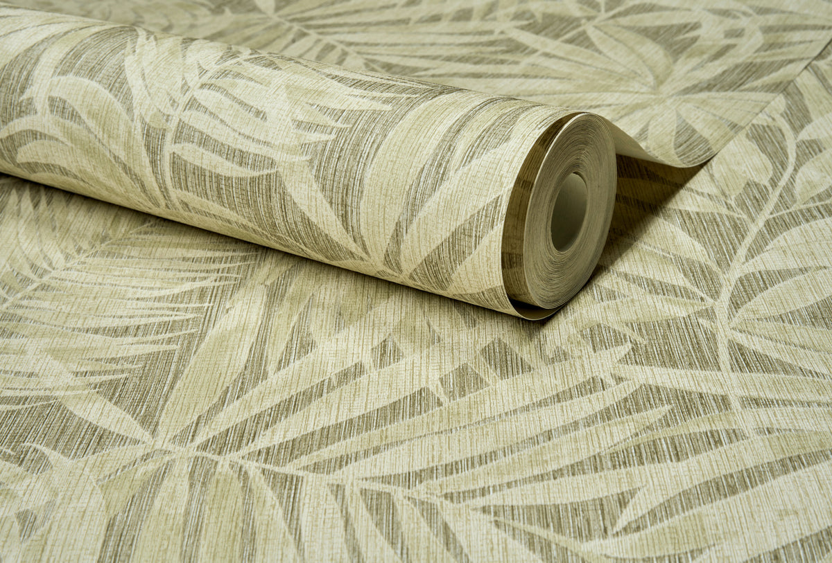 A partially unrolled roll of York Wallcoverings Chesapeake Sonny Fronds Wallpaper features a beige and light brown palm leaf pattern that seamlessly blends into the background.