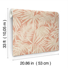 The York Wallcoverings Chesapeake Sonny Fronds Wallpaper features a beige tropical leaf pattern on a coral background and comes in a roll measuring 33 feet (10.05 m) long by 20.86 inches (53 cm) wide.