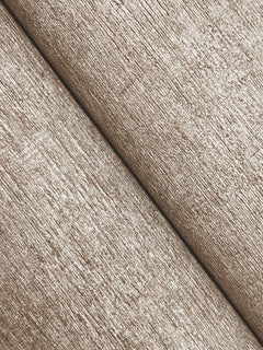 Close-up of Chesapeake Tansy Distressed Wallpaper by York Wallcoverings, featuring a textured, light brown surface with two diagonal seams running from top left to bottom right. The material has a rough appearance, reminiscent of fabric or paper.