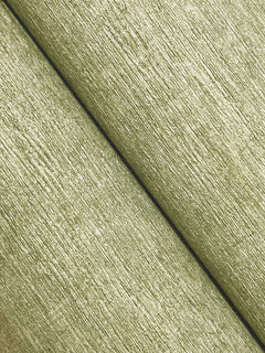 Close-up of two parallel strips of Chesapeake Tansy Distressed Wallpaper by York Wallcoverings, featuring a textured, light greenish surface, running diagonally from top left to bottom right.