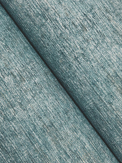 Close-up of two Chesapeake Tansy Distressed Wallpaper surfaces by York Wallcoverings in light blue, placed diagonally to showcase their textured, slightly shiny and worn fabric-like appearance.
