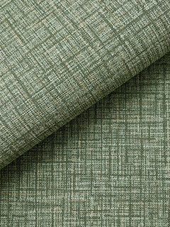 Close-up of Beau Faux Fabric Wallpaper by York Wallcoverings in light green, featuring a subtle grid pattern and two overlapping layers. The wallpaper’s textured weave and fine intersecting lines create a geometric, modern appearance.