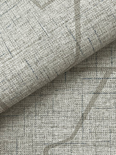 Close-up of the Lyle Abstract Geometric Wallpaper by York Wallcoverings in light gray, featuring a subtle grid pattern and visible weave with thin intersecting lines. A folded section highlights the minimalist, modern aesthetic of the design.