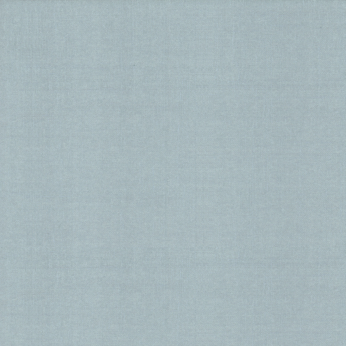 The Woven Linen Wallpaper by York Wallcoverings features a light blue fabric texture with a subtle weave pattern, creating the look of a soft, smooth textile surface.