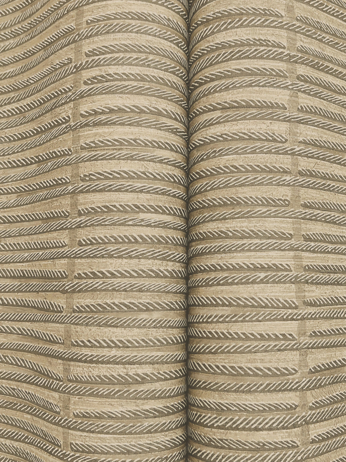 Close-up of Iringa Wallpaper by York Wallcoverings, featuring a repeating pattern of curved, parallel lines and chevron shapes in beige and white tones.