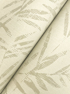 Allerton Bamboo Wallpaper, featuring a beige hue with a subtle, abstract leaf pattern and a slightly textured finish, displayed as two overlapping rolls placed diagonally.