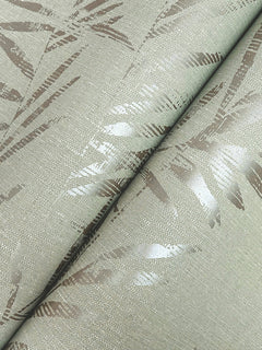 Close-up of the Allerton Bamboo Wallpaper, showcasing its textured surface with a metallic sheen and a subtle, abstract bamboo pattern in shades of light beige and silver.