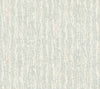 Juju Wallpaper by York Wallcoverings features a light gray and off-white textured pattern with a subtle, vertical abstract design reminiscent of rough brush strokes or tree bark, creating a soft and calming background effect.