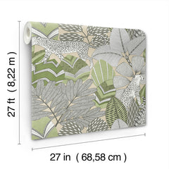 The Namiri Wallpaper by York Wallcoverings features a green, gray, and beige jungle leaf pattern with white leopards. Each roll measures 27 feet (8.22 meters) in length and 27 inches (68.58 cm) in width.