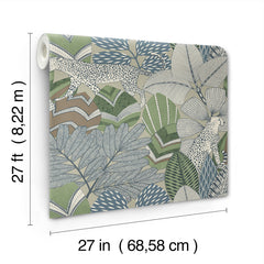 Namiri Wallpaper by York Wallcoverings features a jungle-inspired pattern with leopards and large tropical leaves in green, gray, and beige. Each roll measures 27 feet (8.22 meters) long and 27 inches (68.58 centimeters) wide.