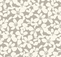 Free Spirit Wallpaper by York Wallcoverings features a seamless pattern of white, abstract floral shapes on a light gray background, creating a modern and minimalistic design.