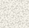 Elevate your space with the Free Spirit Wallpaper by York Wallcoverings, featuring a seamless pattern of abstract, light cream-colored flowers with simple petals on a soft gray background for a delicate and modern floral design.