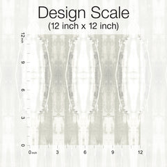 Abstract grayscale pattern with mirrored vertical shapes. A black scale on the left and bottom edges marks inches from 0 to 12. Text above reads: Escalante Wallpaper – Design Scale (12 inch x 12 inch), York Wallcoverings.