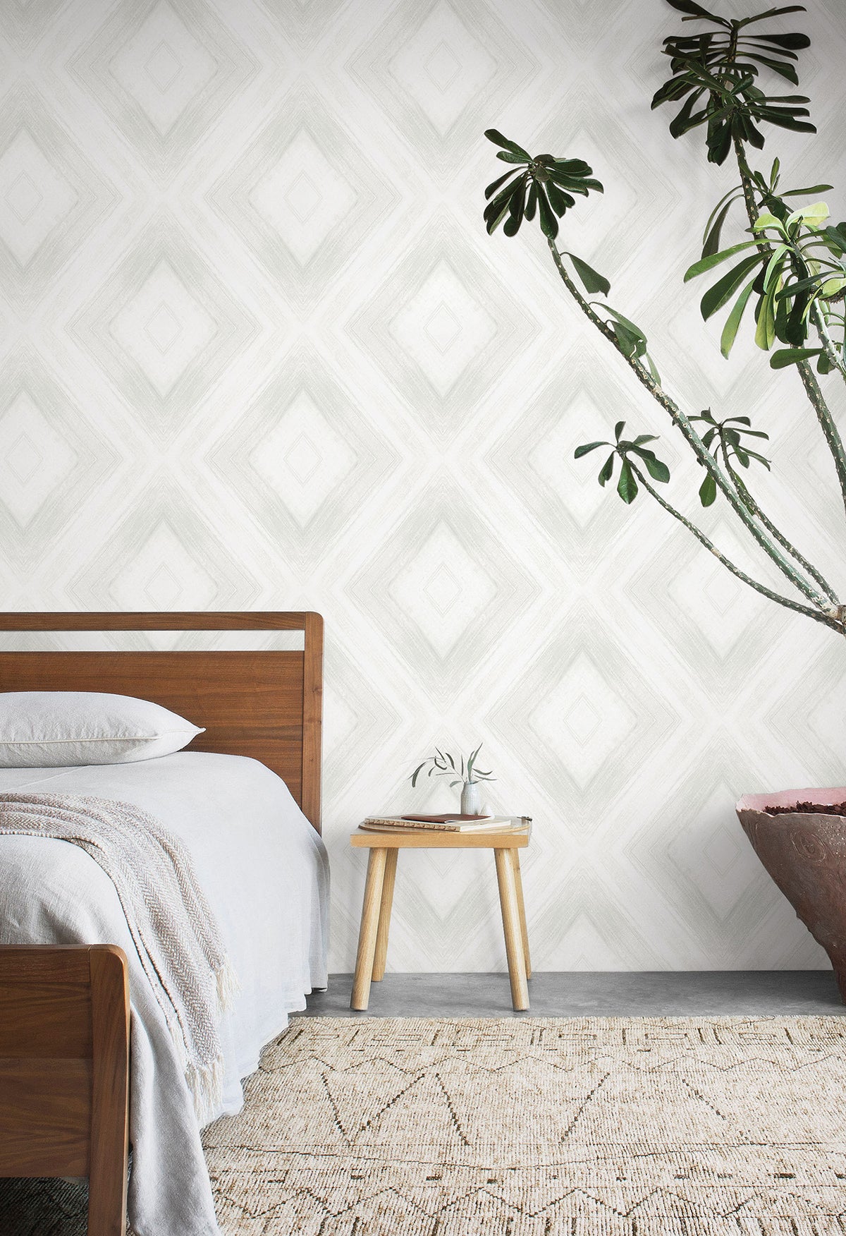 Ballad Wallpaper featuring a light gray, repeating diamond pattern with soft, brushstroke-like lines.