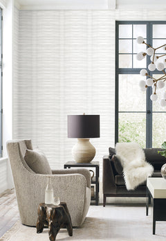 Grey Stone Wallpaper by York Wallcoverings in light grey with a horizontal wavy texture installed in a modern living room.