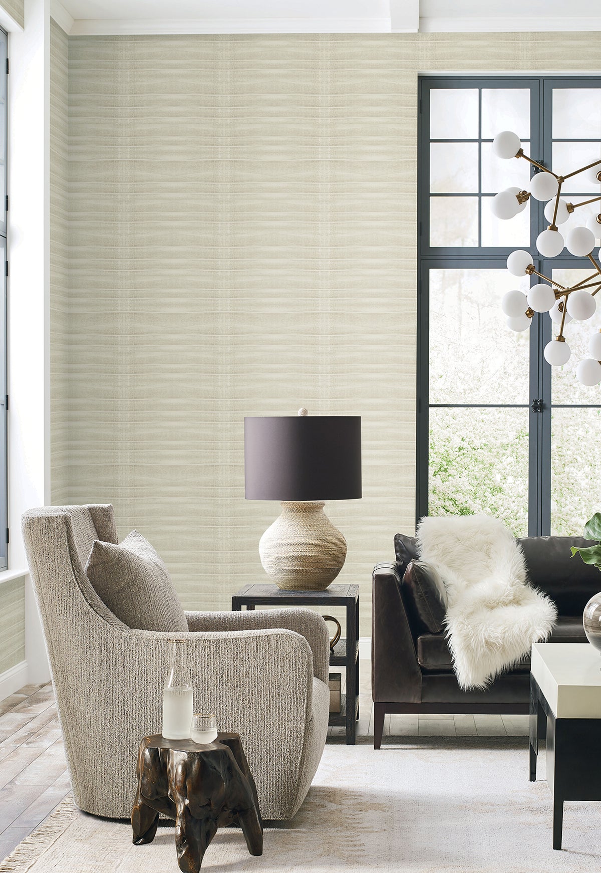 Grey Stone Wallpaper by York Wallcoverings in light grey with a subtle, horizontal textured pattern on a living room wall.