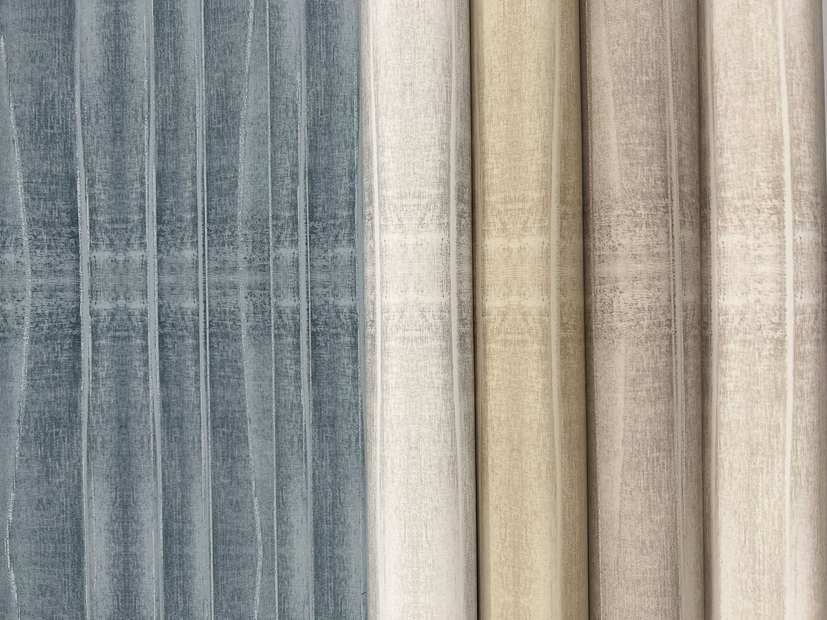 Five rolls of Grey Stone Wallpaper by York Wallcoverings, featuring vertical stone-like patterns in shades of grey, beige, and cream.