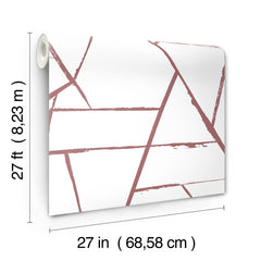 A roll of York Wallcoverings Intersect Wallpaper featuring a geometric pattern of intersecting dusty pink lines on a white background.