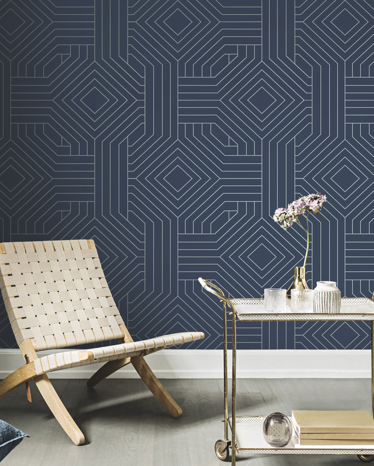 Candice Olson Diverging Diamonds Wallpaper featuring a dark blue background with a geometric pattern of thin white lines forming interlocking diamonds.