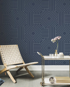 Candice Olson Diverging Diamonds Wallpaper featuring a dark blue background with a geometric pattern of thin white lines forming interlocking diamonds.