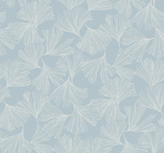 Gingko Toss Wallpaper by York Wallcoverings features a light blue background adorned with a delicate, airy pattern of thin, hand-drawn white ginkgo leaves. The fan-shaped leaves are slightly overlapping in a repeating design.
