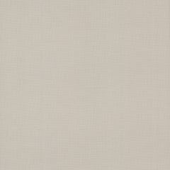 A close-up view of York Wallcoverings’ Gossamer Woven Wallpaper in a light beige shade reveals a subtle texture with delicate, barely-visible vertical and horizontal woven lines.