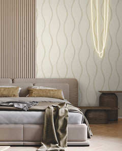 Bedroom featuring Candice Olson Unfurl Wallpaper by York Wallcoverings with a vertical wavy line pattern in a neutral color palette.