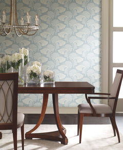 Dining room wall covered in Candice Olson Dancing Leaves Wallpaper, featuring a pale blue background with a white stylized fan-leaf pattern.