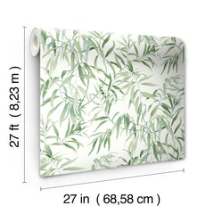 The Willow Grove Wallpaper by York Wallcoverings features a green leafy pattern on a white background and comes in a roll measuring 27 feet (8.23 meters) long and 27 inches (68.58 cm) wide.