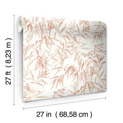 The Willow Grove Wallpaper by York Wallcoverings features a pink and beige leafy pattern and comes in a roll measuring 27 feet (8.23 m) long and 27 inches (68.58 cm) wide, displayed against a white background.