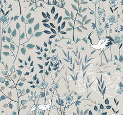 Ronald Redding Aspen Wallpaper features a light gray background with illustrations of cranes, spotted deer, and stylized trees and flowers in shades of blue and black.