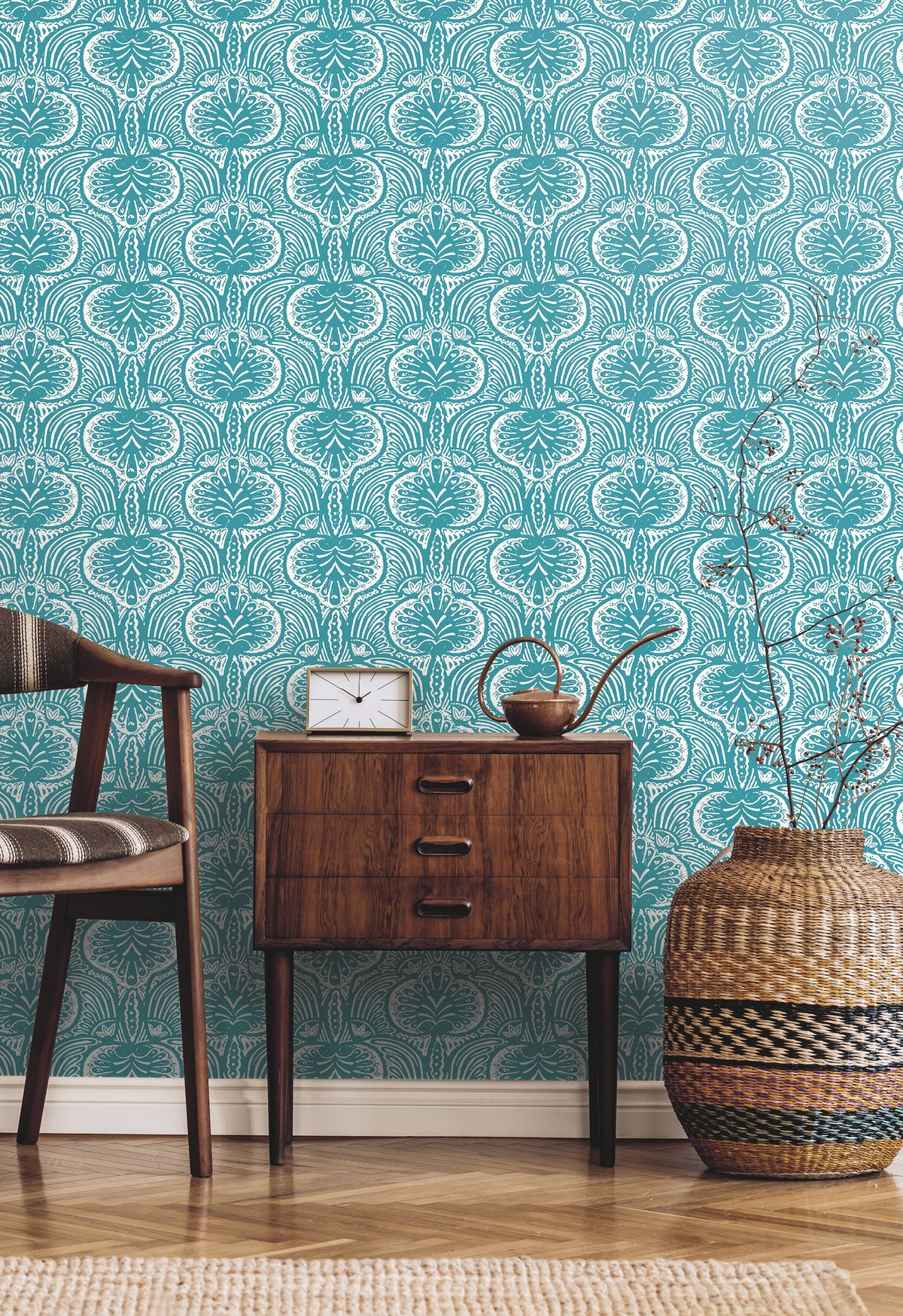 Ronald Redding Lotus Palm Wallpaper featuring a teal background with a white repeating botanical pattern of fan-shaped leaves and scrolling stems.