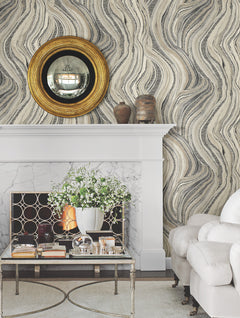 Ronald Redding Streaming Cheetah wallpaper featuring a pattern of undulating, flowing lines filled with small black-and-white leopard spots on a light background.