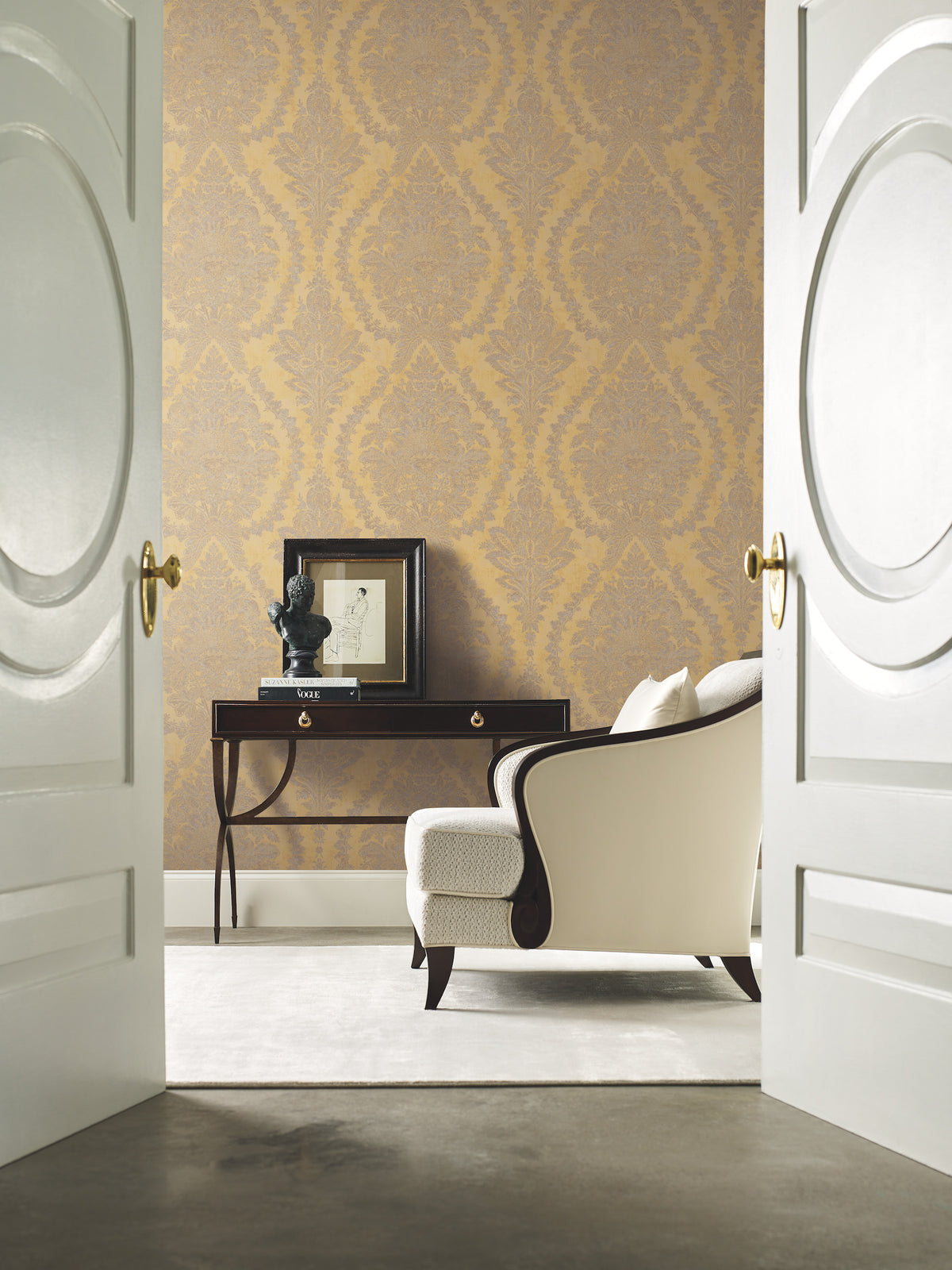 Ronald Redding Charleston Damask Wallpaper in gold and gray featuring a traditional botanical pattern.