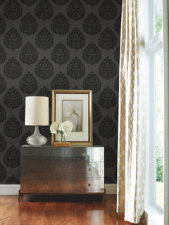 Ronald Redding Teardrop Damask Wallpaper featuring a black, repeating teardrop-shaped damask pattern on a charcoal gray background.