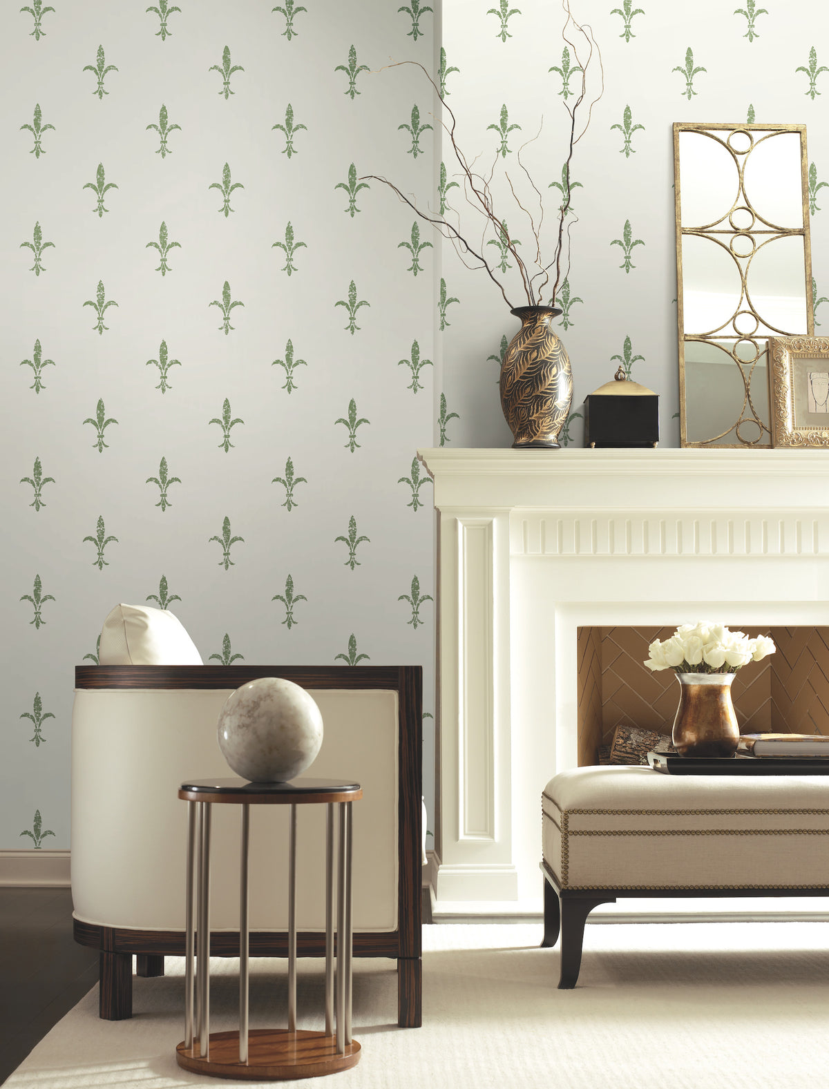Ronald Redding Fleur De Lis Wallpaper featuring a repeating green fleur-de-lis pattern on a white background in a furnished room with a fireplace.