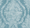 Ronald Redding Charleston Damask Wallpaper featuring a large-scale, ornate white damask floral pattern on a light blue background.